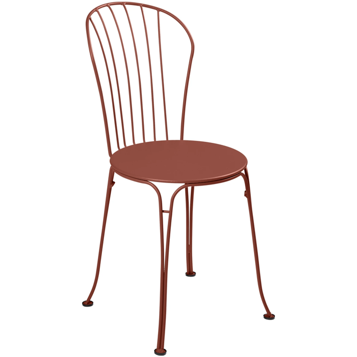 Photo of Opéra+ Chair - Red Ochre - Outdoor dining chairs - Studio Fermob - Red - Metal