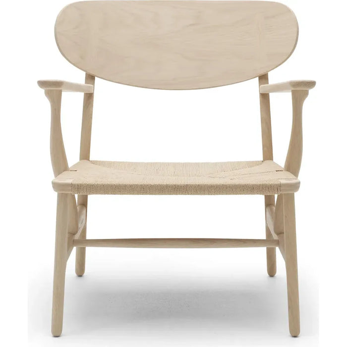 Photo of Carl Hansen - Ch22,soaped Oak, Natural Braided Paper Cord - Armchairs - Hans J. Wegner - Wood-coloured - Natural materials/wood
