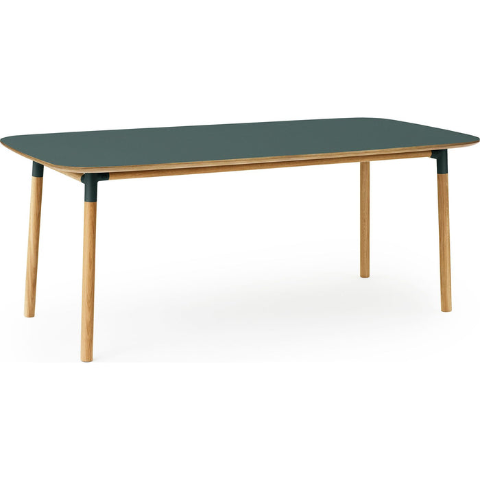 Photo of Form Dining Table Green. Oak Legs