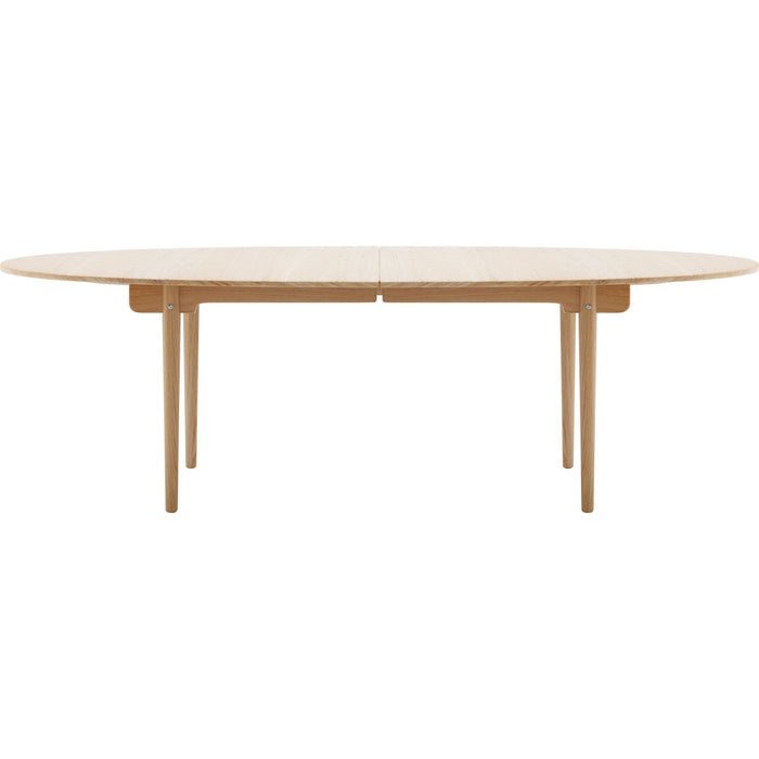 Photo of Carl Hansen - Ch339, clear lacquered oak, with space for 4 extension leaves - dining table - Hans J. Wegner - wood-coloured - wood