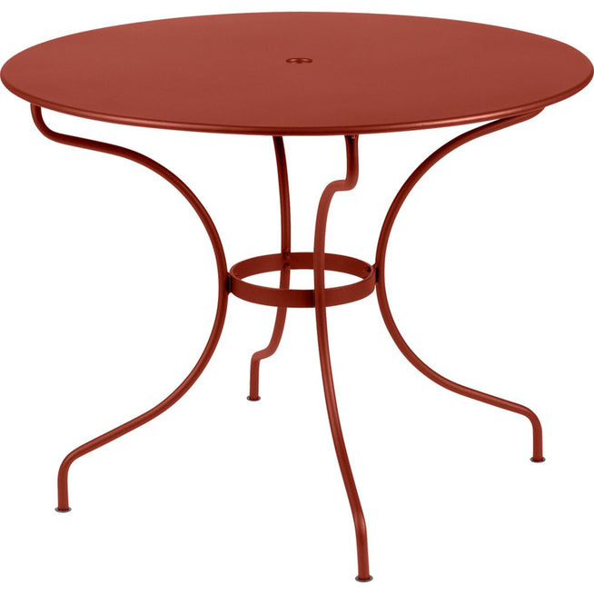 Photo of Opéra+ Table Ø 96 cm, Red Ochre - Outdoor dining table - Studio Fermob - Red - Metal