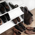 Thumbnail photo of String Shoe Rack in Metal 58x30, White - Shoe Racks - Nils Strinning - Beige - Metal