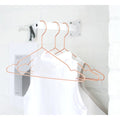 Thumbnail photo of Hang Coat Hangers