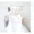 Thumbnail photo of Hang Coat Hangers