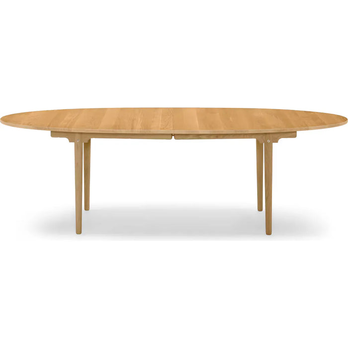 Ch339 dining table from Carl Hansen & Søn (oak, oil, pull-out for 2 leaves incl. 1 wooden support leg in black)