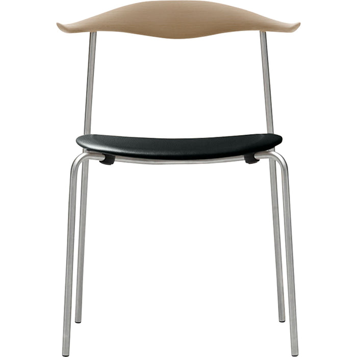 Photo of Carl Hansen - Ch88P - Upholstered seat, soaped oak, leather group A Loke - 7150, stainless steel legs - dining chairs - Hans J. Wegner - black - metal/wood