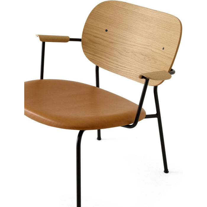 Photo of Co Lounge Chair Black Base Natural Oak Back, Dakar 250 - Dining Chairs - Norm Architects - Wood Colored - Leather/Metal/Wood/Foam