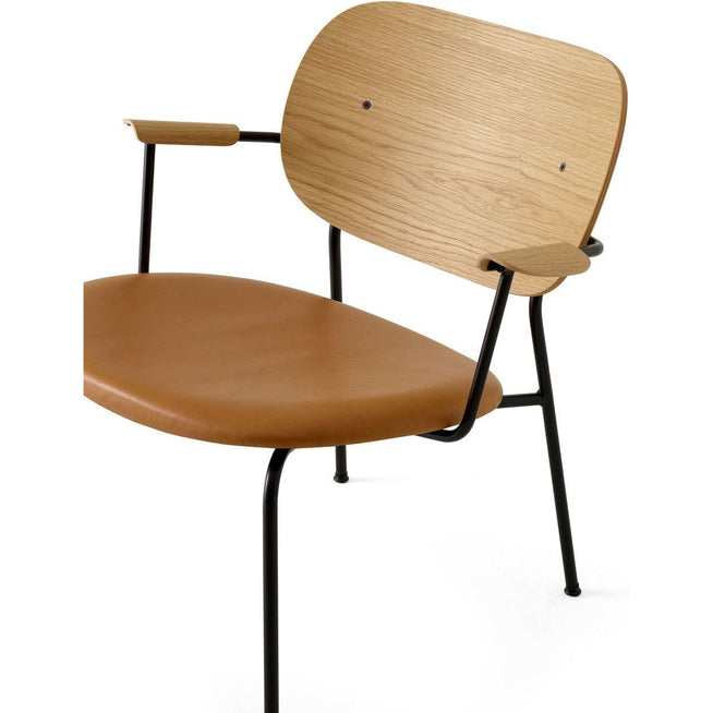Photo of Co Lounge Chair Black Base Natural Oak Back, Dakar 250 - Dining Chairs - Norm Architects - Wood Colored - Leather/Metal/Wood/Foam