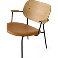 Thumbnail photo of Co Lounge Chair Black Base Natural Oak Back, Dakar 250 - Dining Chairs - Norm Architects - Wood Colored - Leather/Metal/Wood/Foam