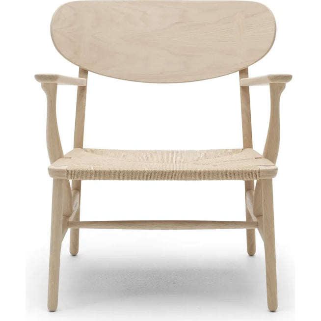 Photo of Carl Hansen - Ch22,soaped Oak, Natural Braided Paper Cord - Armchairs - Hans J. Wegner - Wood-coloured - Natural materials/wood