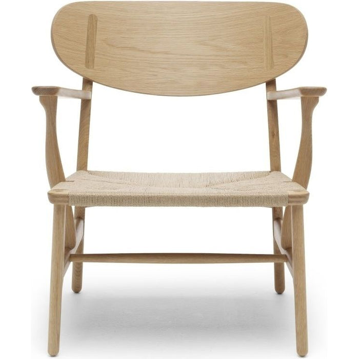 Photo of Carl Hansen - Ch22, Oiled Oak, Chord Black - Armchairs - Hans J. Wegner - Wood-coloured - Natural material/wood