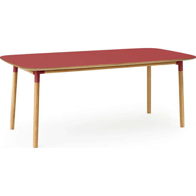 Photo of Form Dining Table Red. Oak Legs
